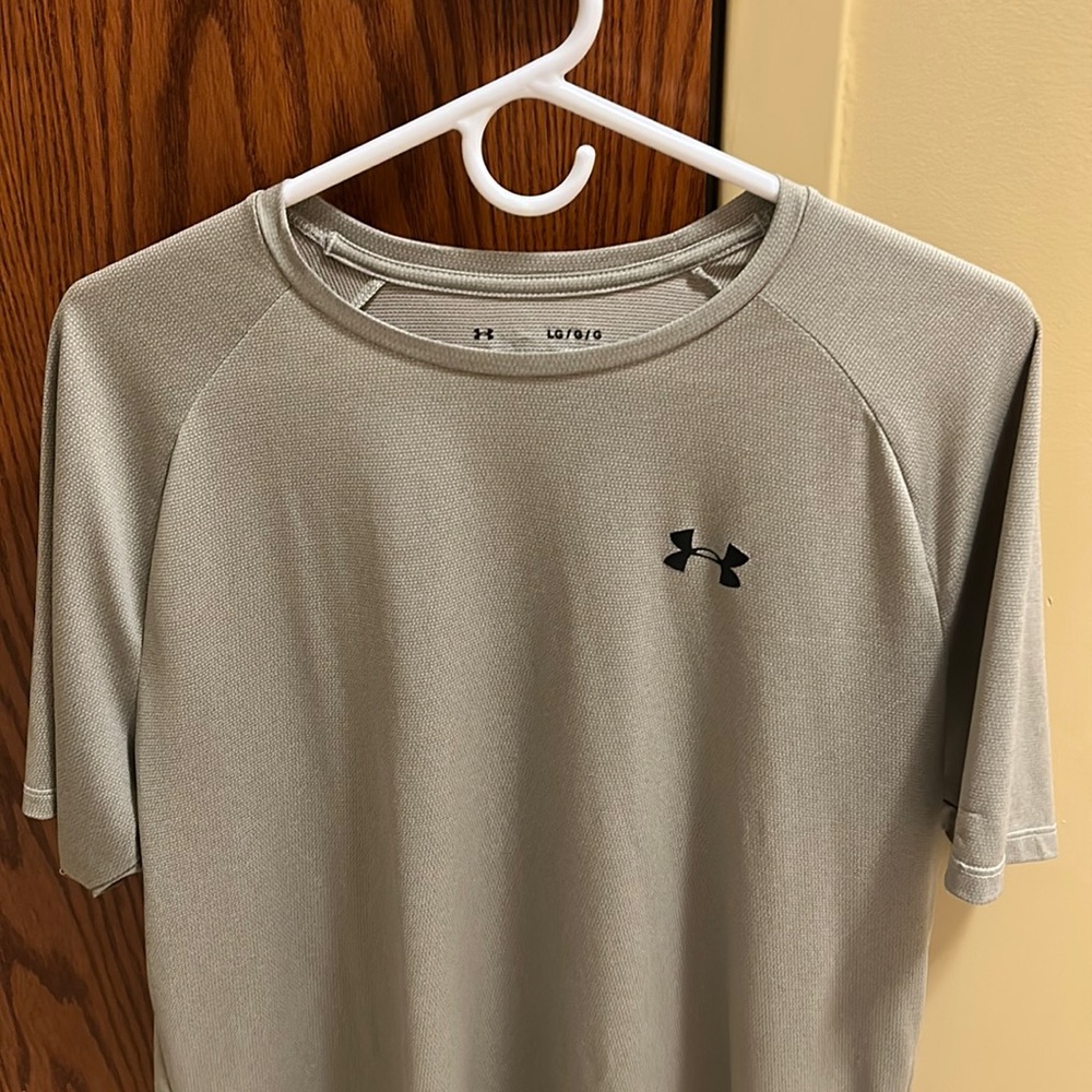 Under armour shirt. Loose fit.